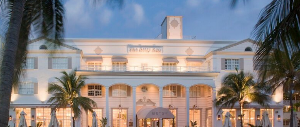 Betsy hotel at dusk with lights on